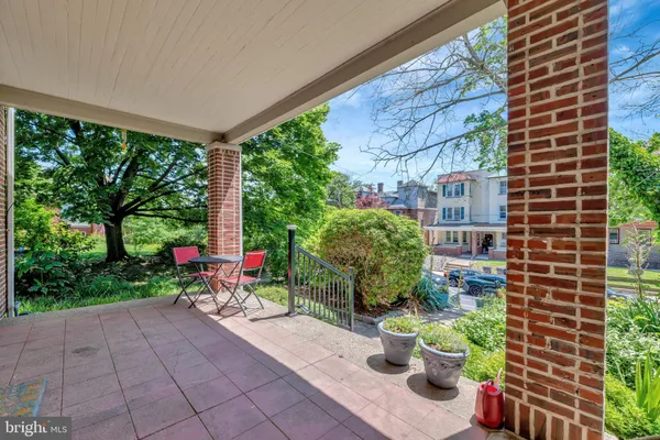 a garden view with a seating space