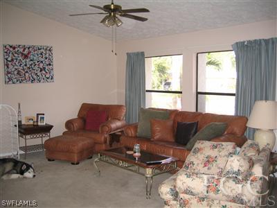 17428 Ingram Road Fort Myers, FL 33967 - Photo 3 of 9 a living room with furniture and a window