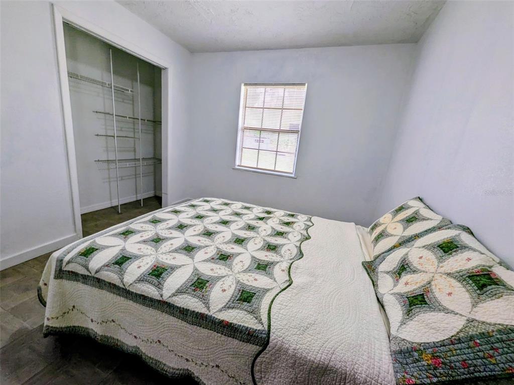 1142 Doc Coil Road Bowling Green, FL 33834 - Photo 11 of 27 a bedroom with a bed and a window