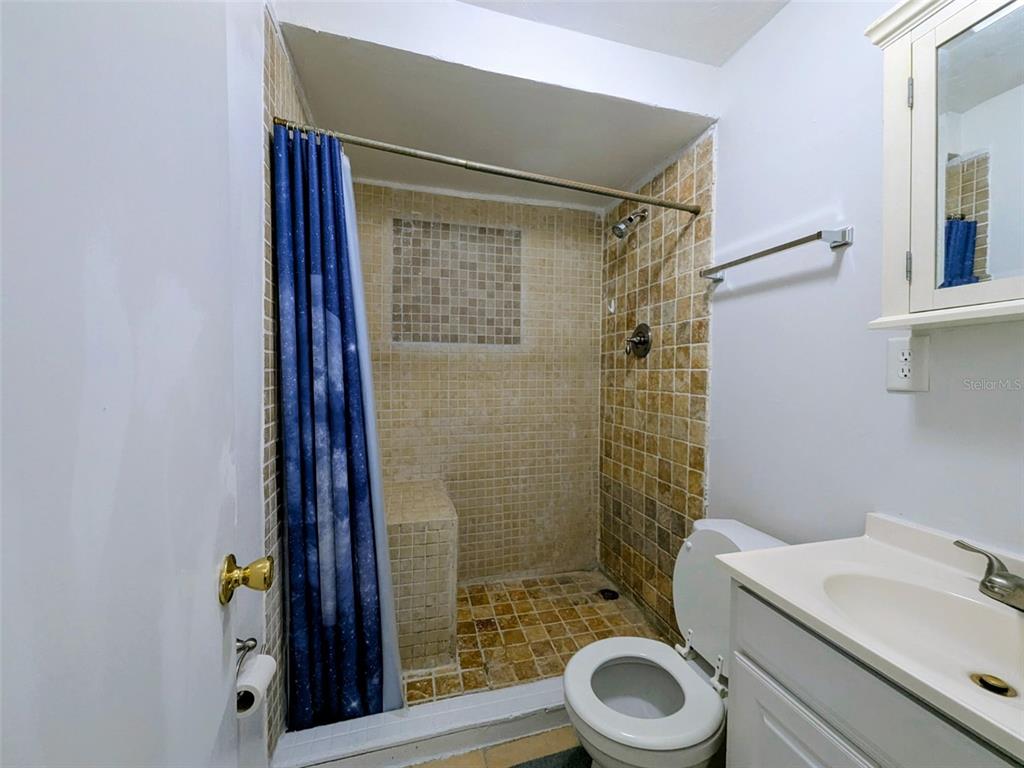1142 Doc Coil Road Bowling Green, FL 33834 - Photo 10 of 27 a bathroom with a sink toilet and shower