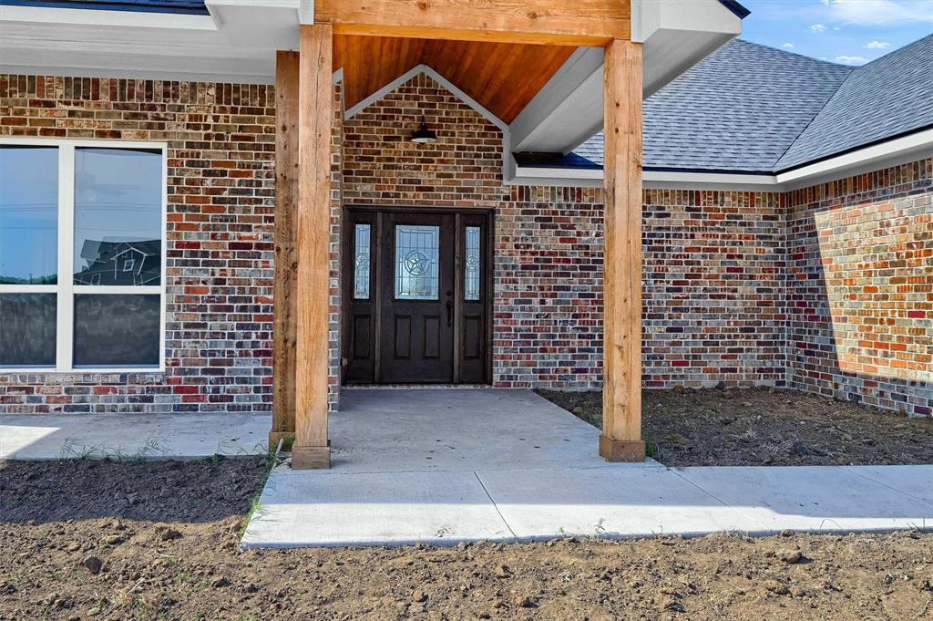 436 Dixie Road Whitesboro, TX 76273 - Photo 4 of 33 a front view of a house