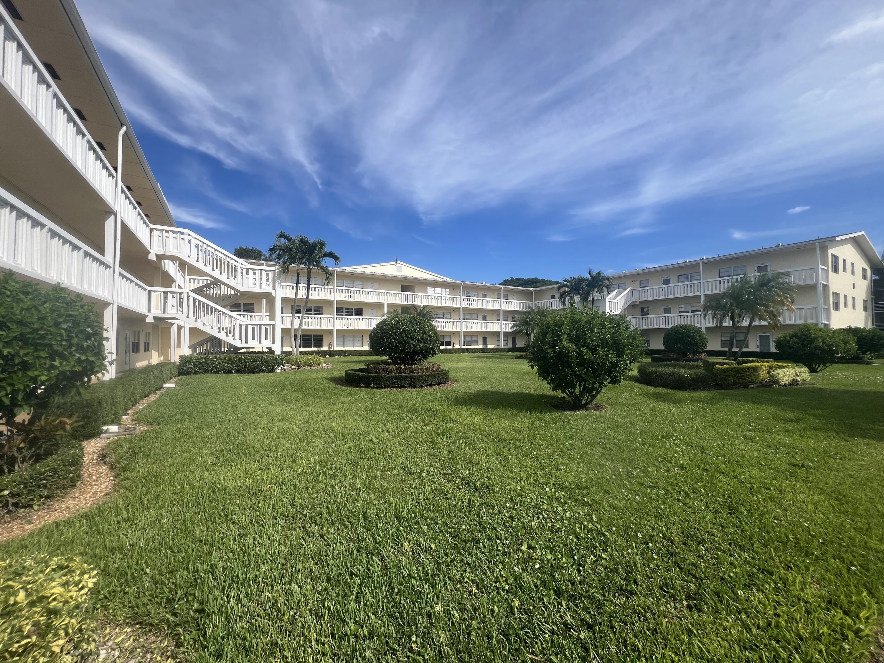 79 Dorset B Boca Raton, FL 33434 - Photo 1 of 12 a view of a house with a back yard
