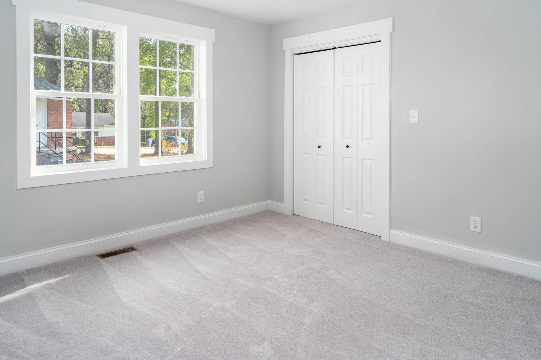 2108 Ramseur Street Raleigh, NC 27610 - Photo 16 of 26 an empty room with a window