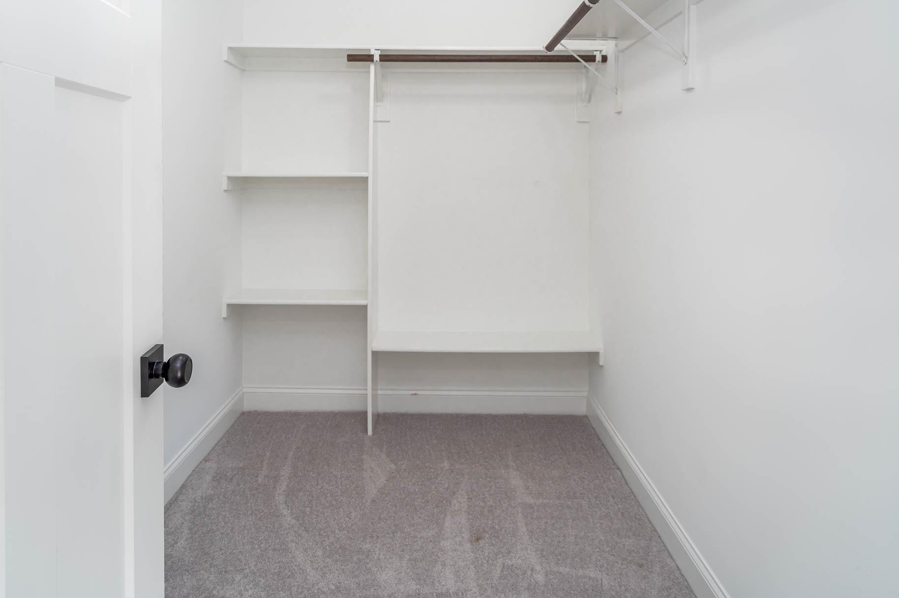 2108 Ramseur Street Raleigh, NC 27610 - Photo 19 of 26 a view of an empty walk in closet