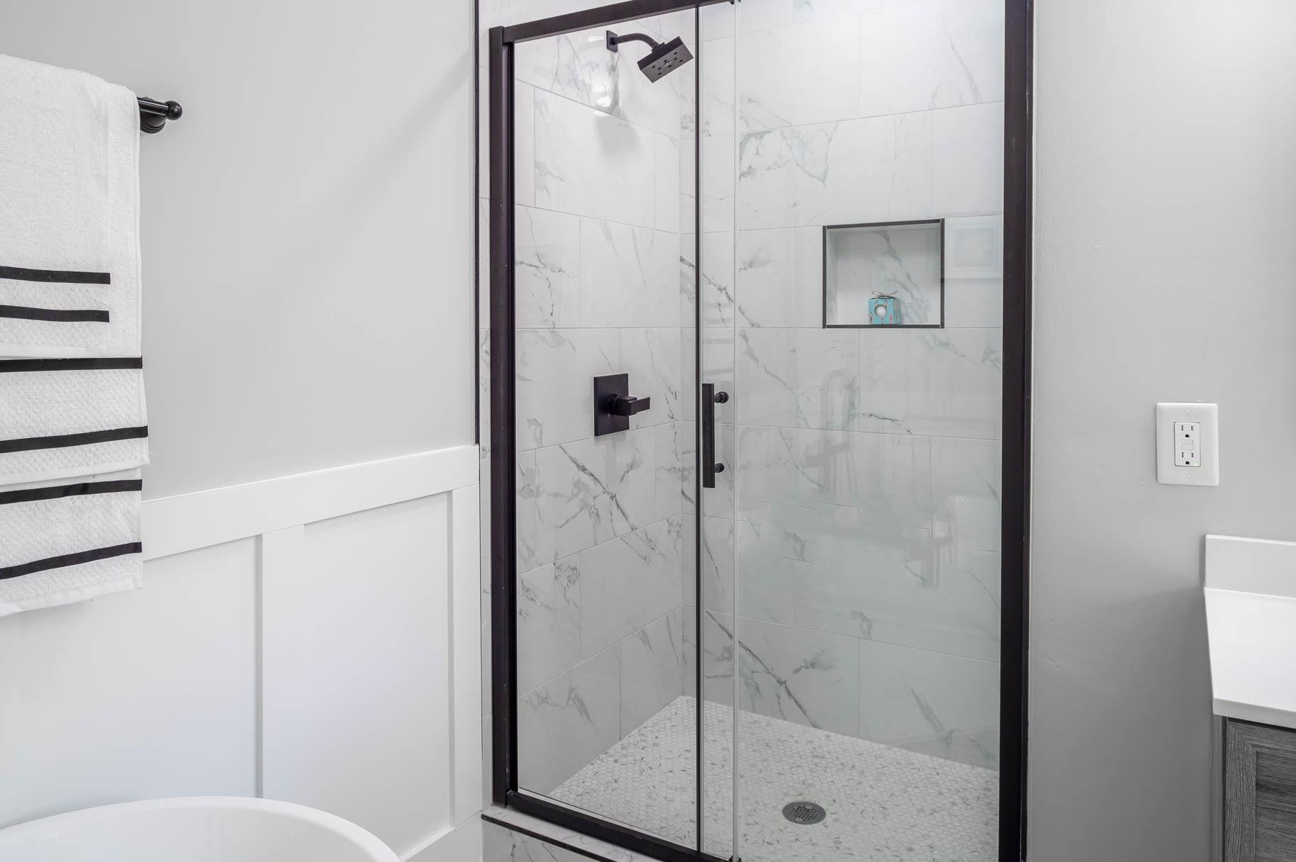 2108 Ramseur Street Raleigh, NC 27610 - Photo 22 of 26 a bathroom with a shower