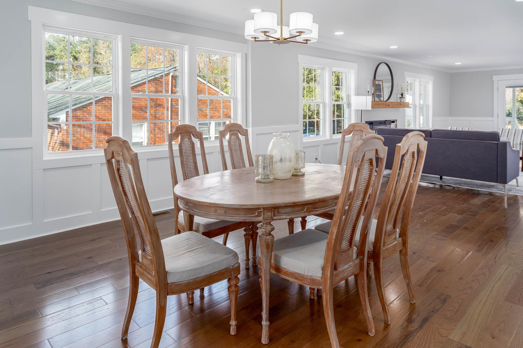 2108 Ramseur Street Raleigh, NC 27610 - Photo 10 of 26 a view of a dining room with furniture window and wooden floor
