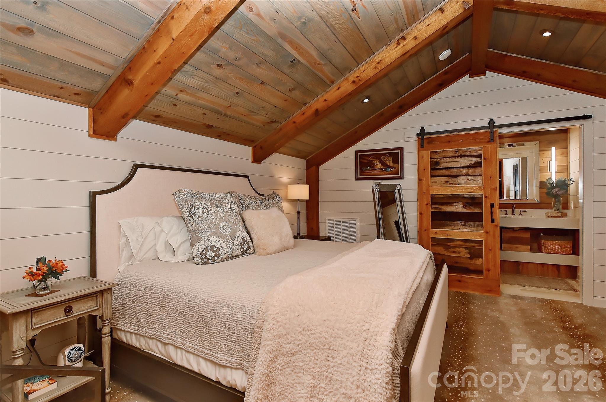 153 Badenyon Place Union Grove, NC 28689 - Photo 14 of 48 a bed room with a bed and a television
