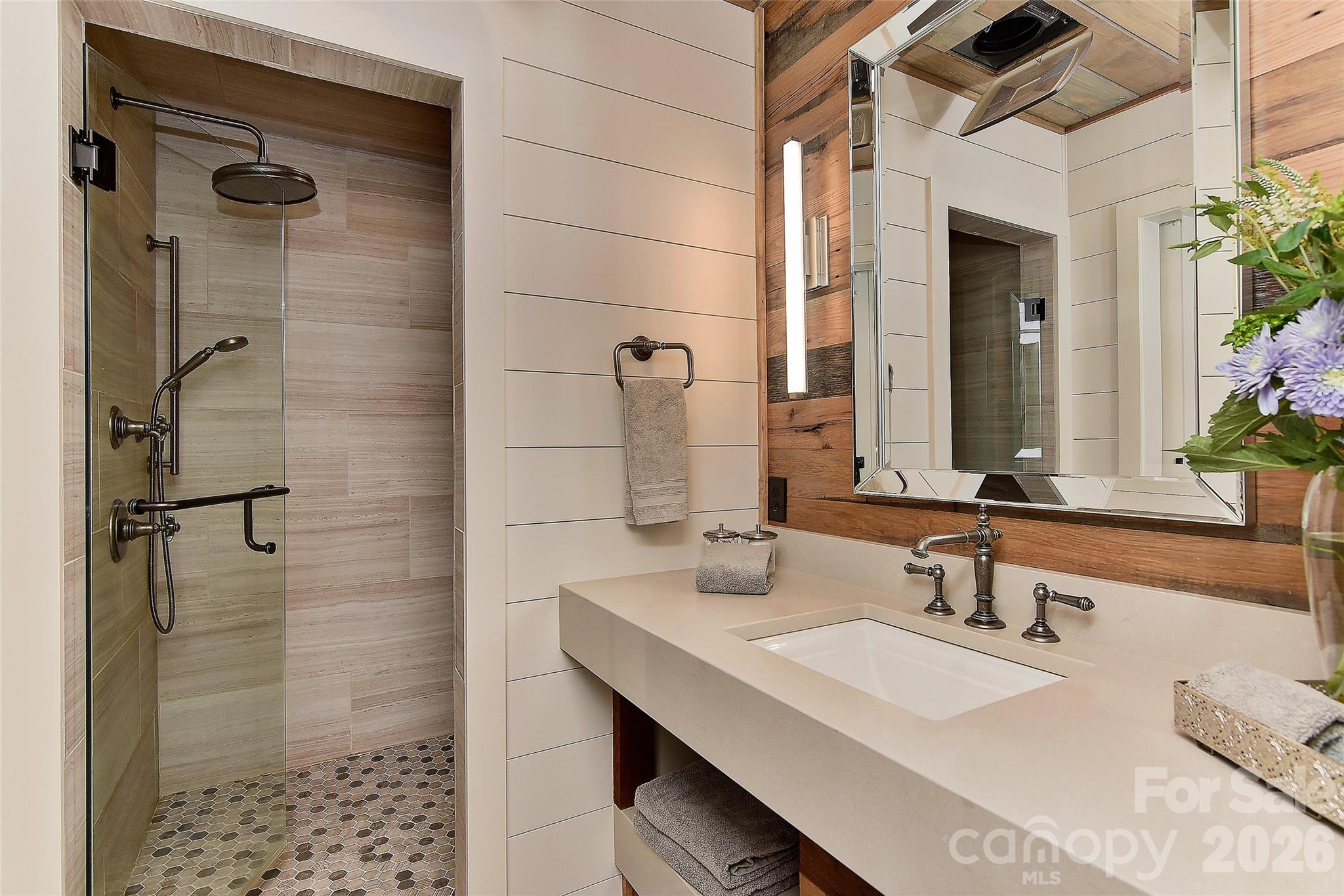 153 Badenyon Place Union Grove, NC 28689 - Photo 15 of 48 a bathroom with a sink and a mirror