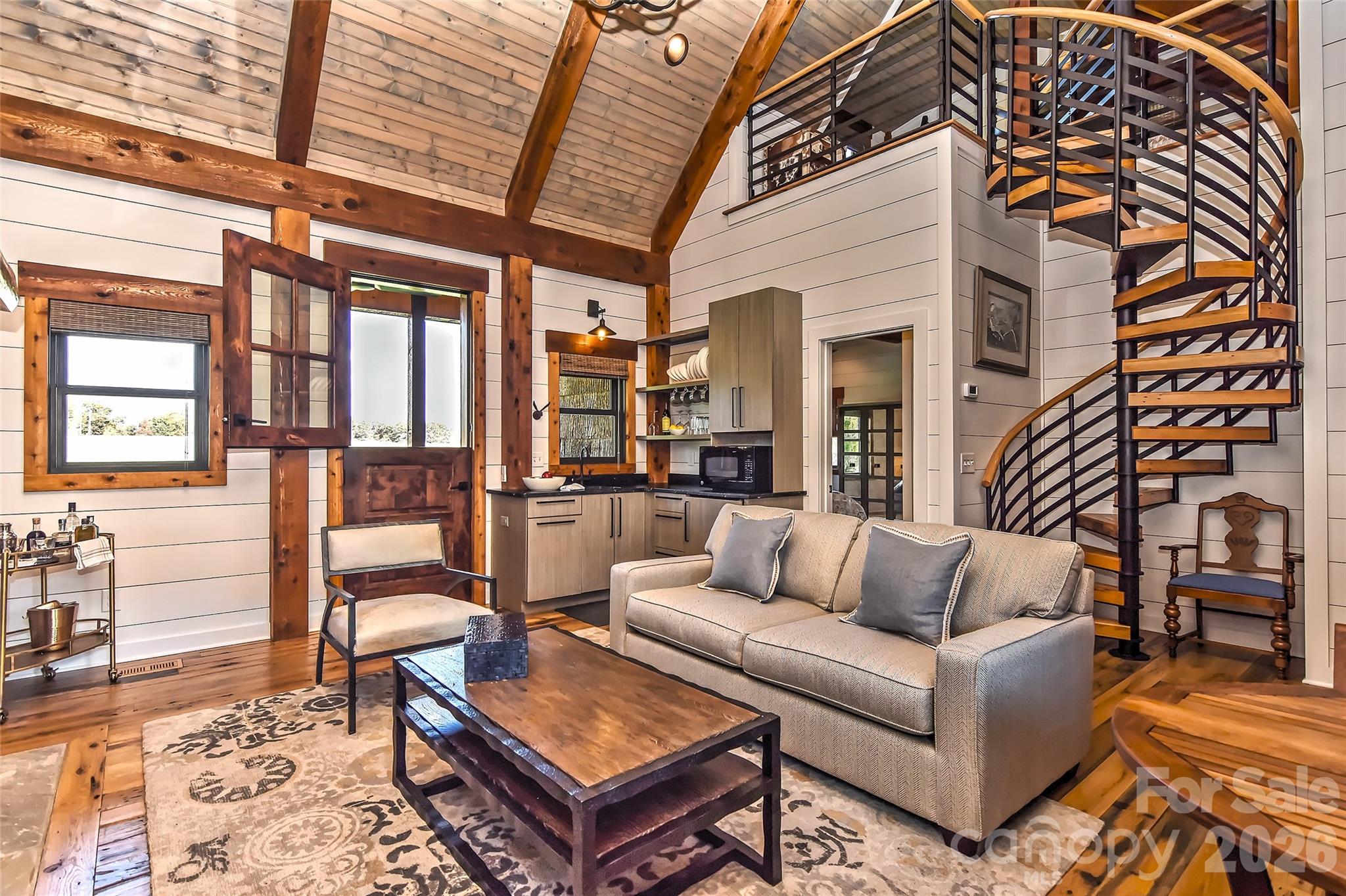 153 Badenyon Place Union Grove, NC 28689 - Photo 31 of 48 a view of a patio with couches chairs and wooden floor