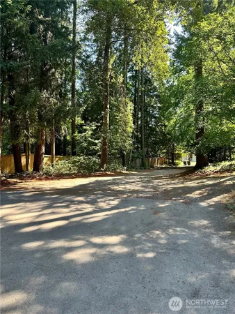 a view of street along with trees