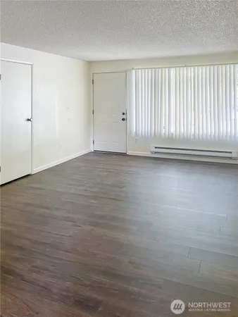 a view of a livingroom with an empty space