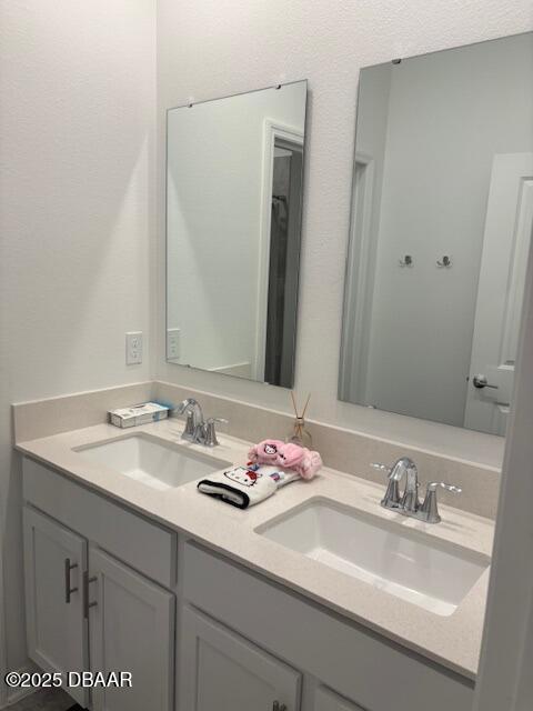 3966 Willowbrook Drive Edgewater, FL 32141 - Photo 13 of 20 a bathroom with double sink and a mirror