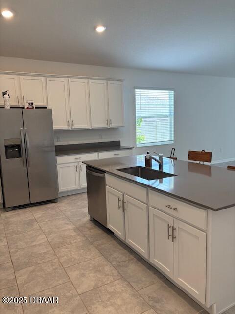 3966 Willowbrook Drive Edgewater, FL 32141 - Photo 6 of 20 a kitchen with cabinets a sink and appliances