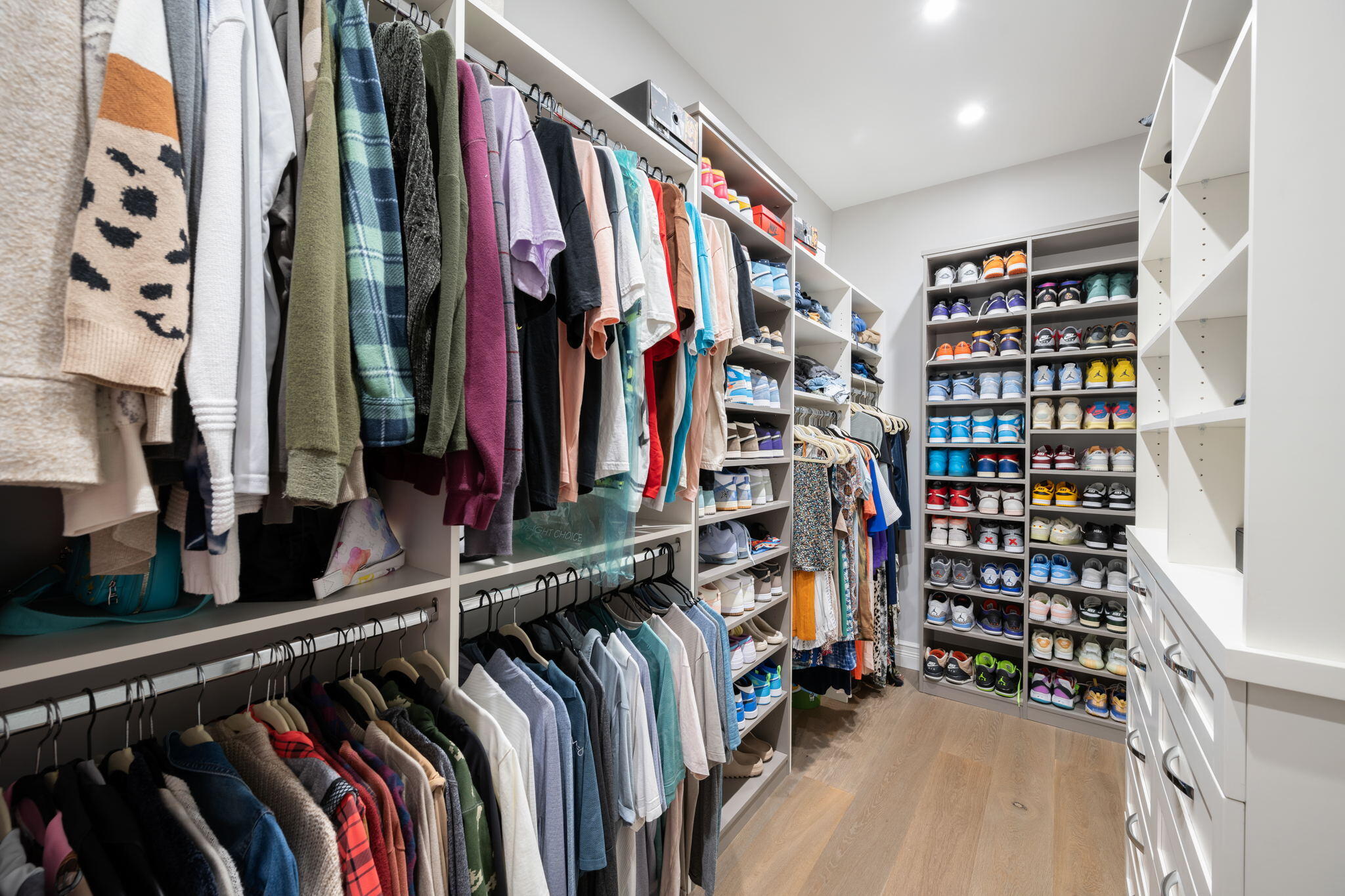 544 Live Oak Road Vero Beach, FL 32963 - Photo 27 of 55 a view of walk in closet with clothes and shoes