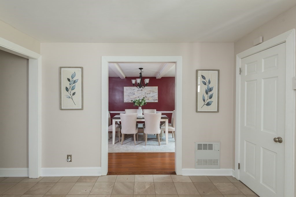 7 Longfellow Road Winchester, MA 01890 - Photo 11 of 42 a view of a livingroom with furniture and a dining table