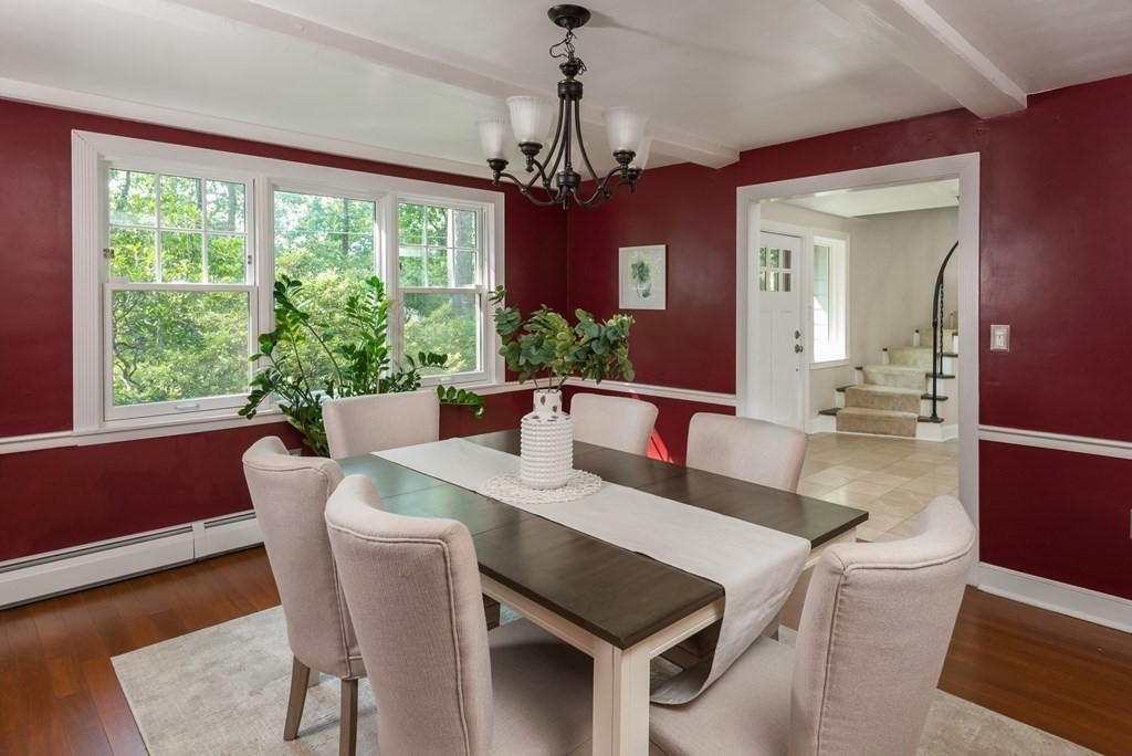 7 Longfellow Road Winchester, MA 01890 - Photo 13 of 42 a view of a dining room with furniture window and wooden floor