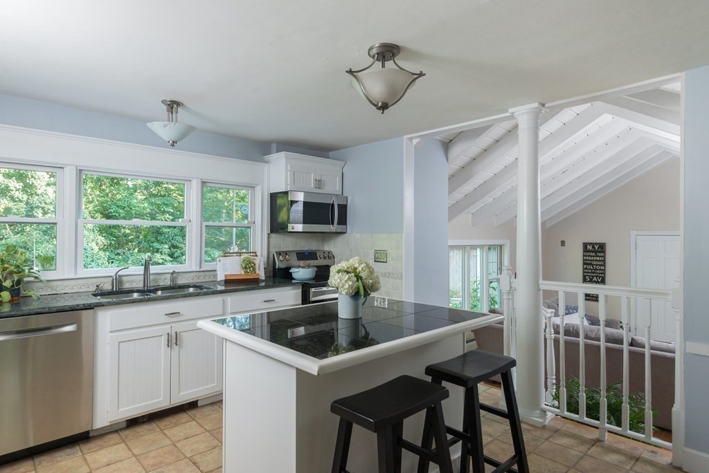 7 Longfellow Road Winchester, MA 01890 - Photo 15 of 42 a kitchen that has a sink window and cabinets