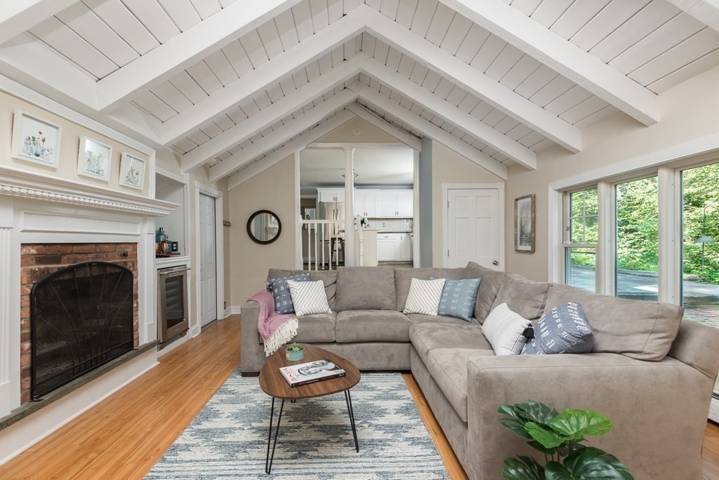 7 Longfellow Road Winchester, MA 01890 - Photo 20 of 42 a living room with furniture and a fireplace