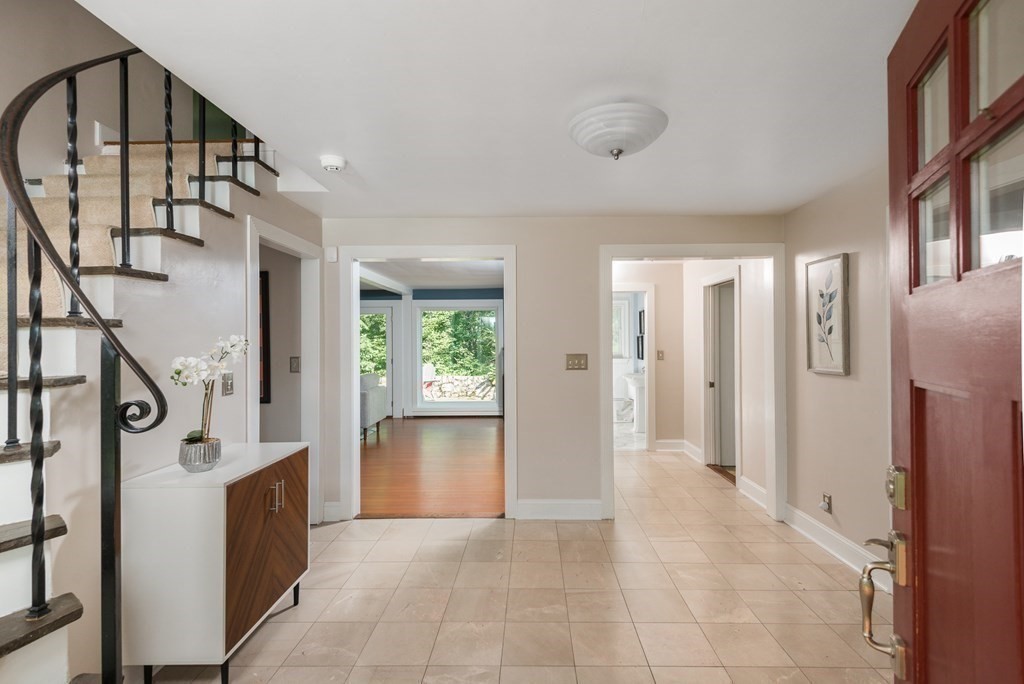 7 Longfellow Road Winchester, MA 01890 - Photo 2 of 42 a view of an entryway with workspace and a livingroom