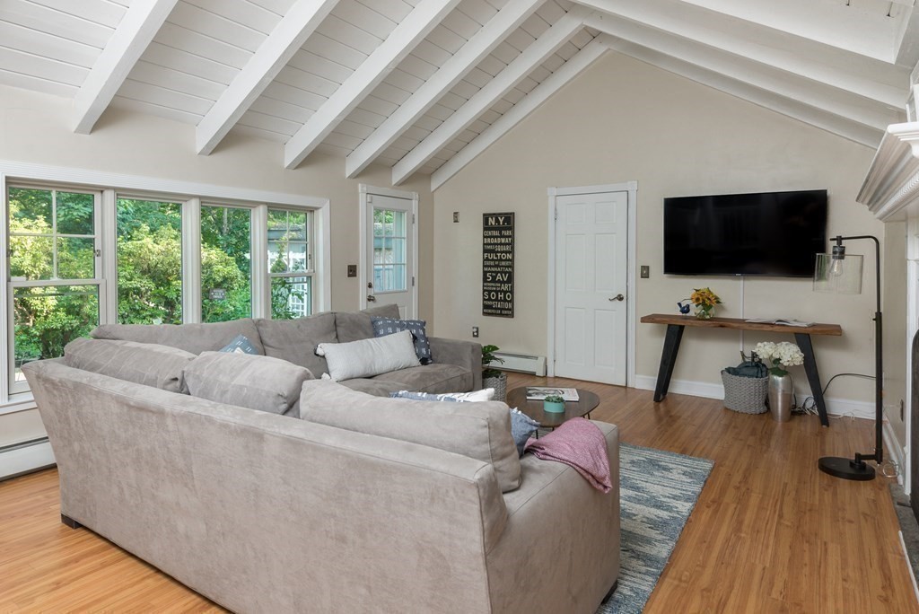7 Longfellow Road Winchester, MA 01890 - Photo 21 of 42 a living room with furniture and a flat screen tv