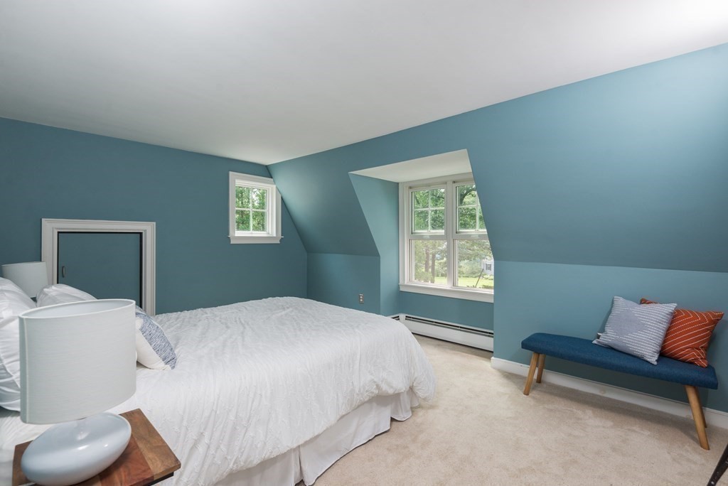 7 Longfellow Road Winchester, MA 01890 - Photo 28 of 42 a bedroom with a bed and a window