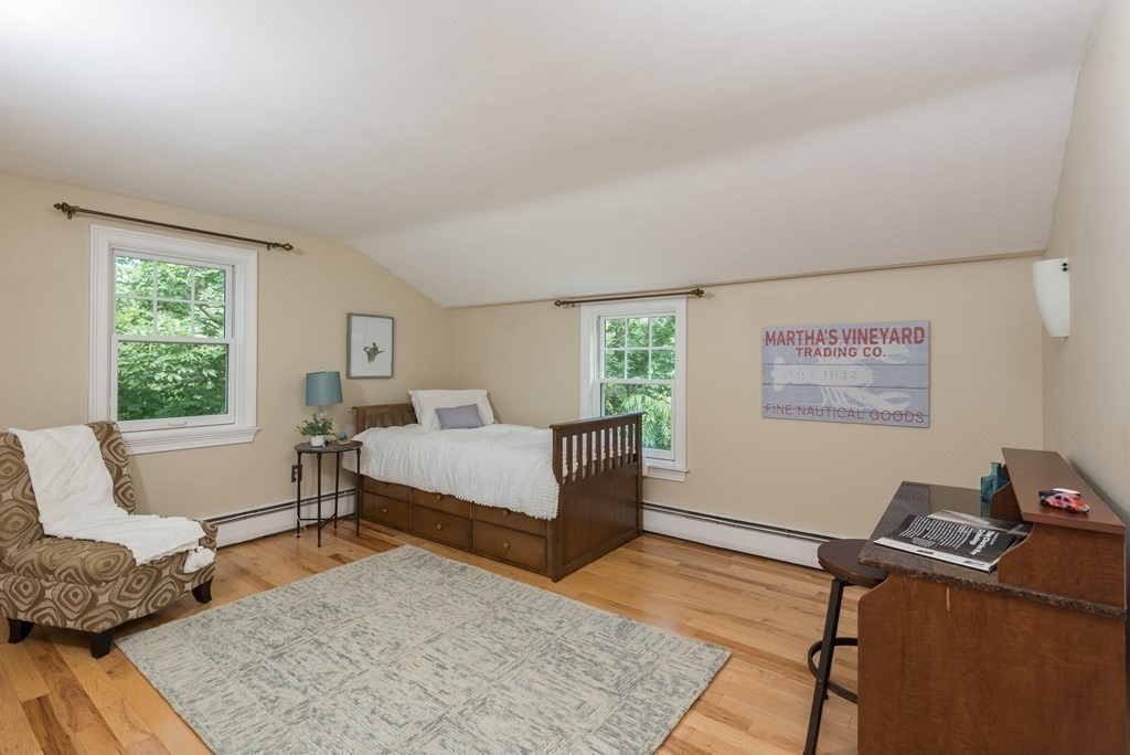 7 Longfellow Road Winchester, MA 01890 - Photo 30 of 42 a living room with furniture and a window