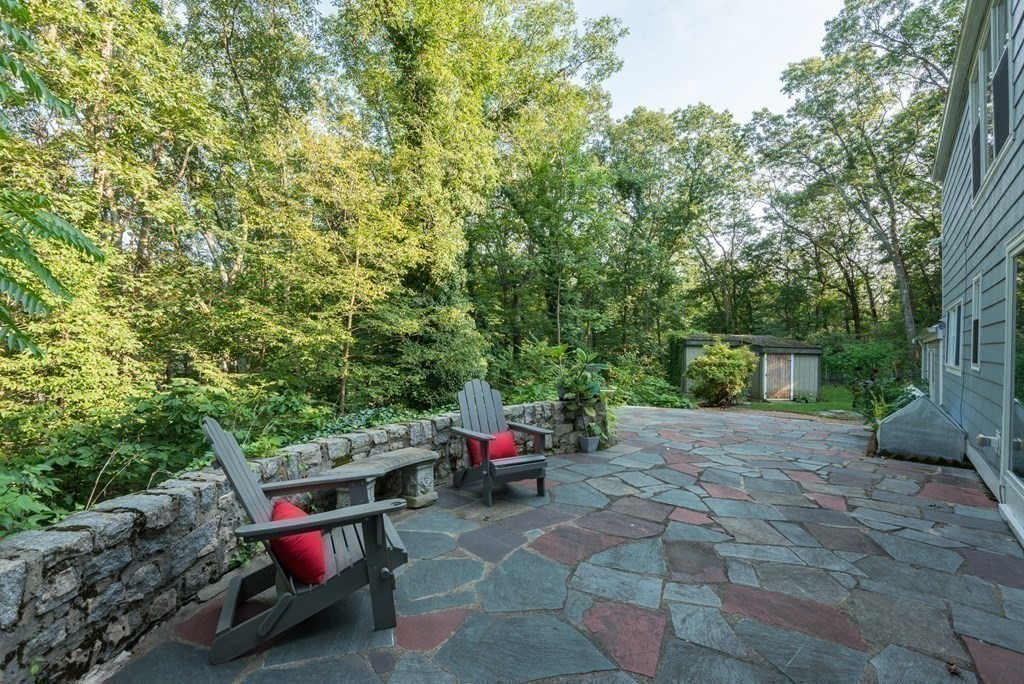 7 Longfellow Road Winchester, MA 01890 - Photo 37 of 42 a view of backyard with seating space and trees