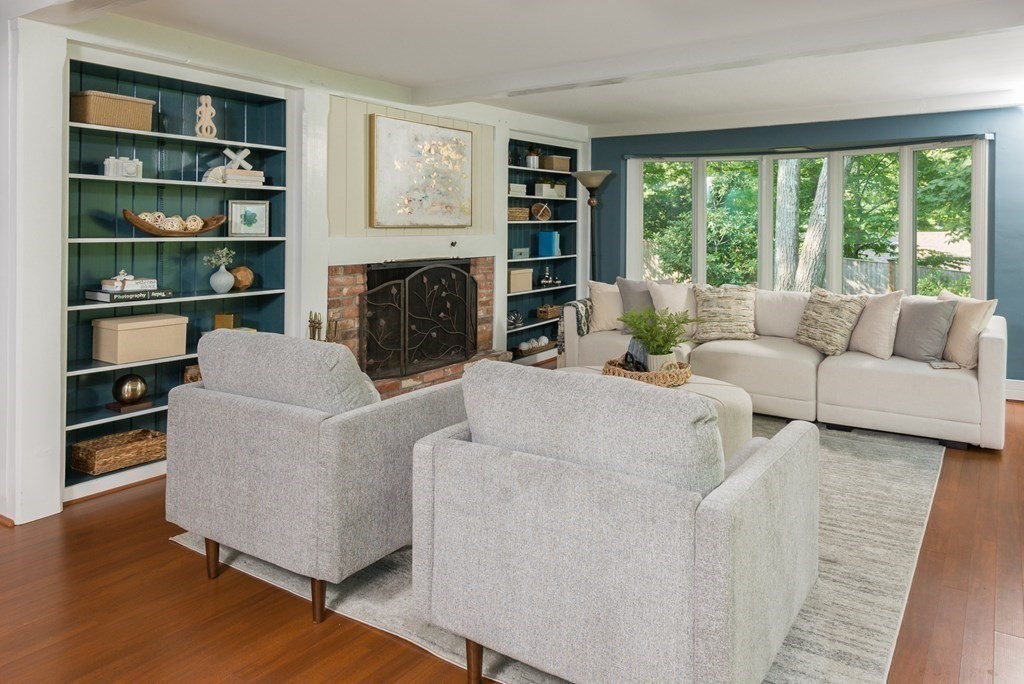 7 Longfellow Road Winchester, MA 01890 - Photo 5 of 42 a living room with furniture and a fireplace