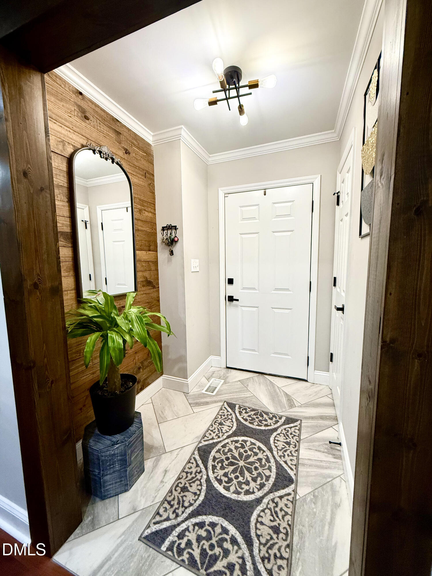 1020 Laurel Leaf Road Zebulon, NC 27597 - Photo 7 of 27 a living room with furniture and a potted plant