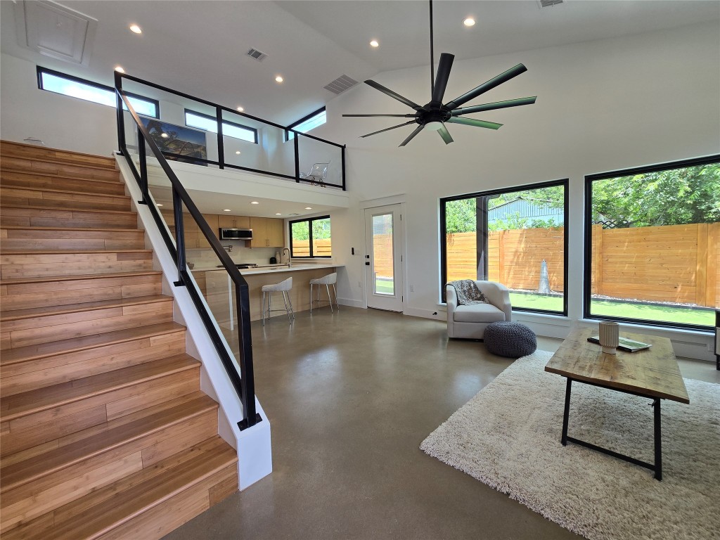 1112 West N Loop Boulevard Austin, TX 78756 - Photo 1 of 1 a living room with furniture and a large window