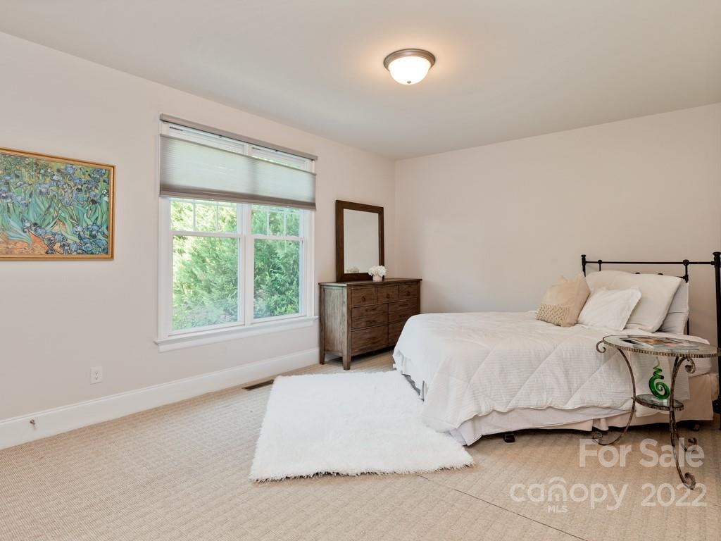 5711 Morris Hunt Drive Fort Mill, SC 29708 - Photo 17 of 43 a bedroom with a bed next to a window