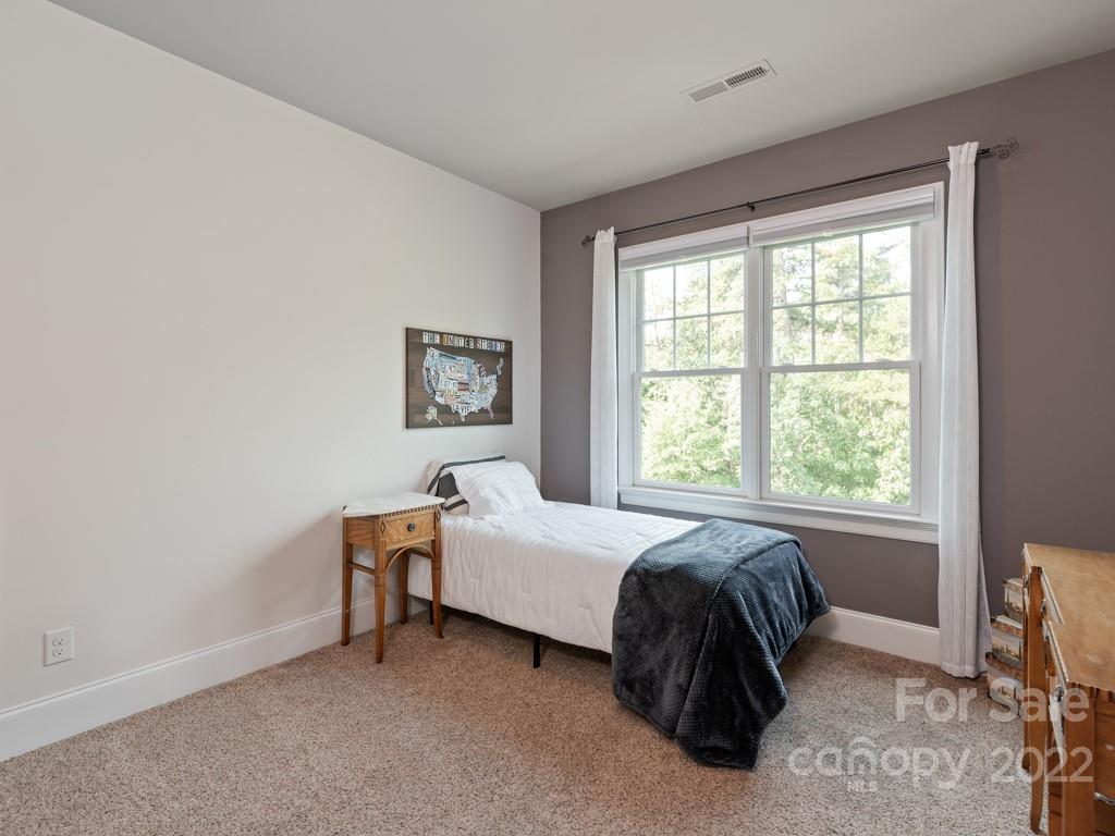 5711 Morris Hunt Drive Fort Mill, SC 29708 - Photo 20 of 43 a bedroom with a bed and a window
