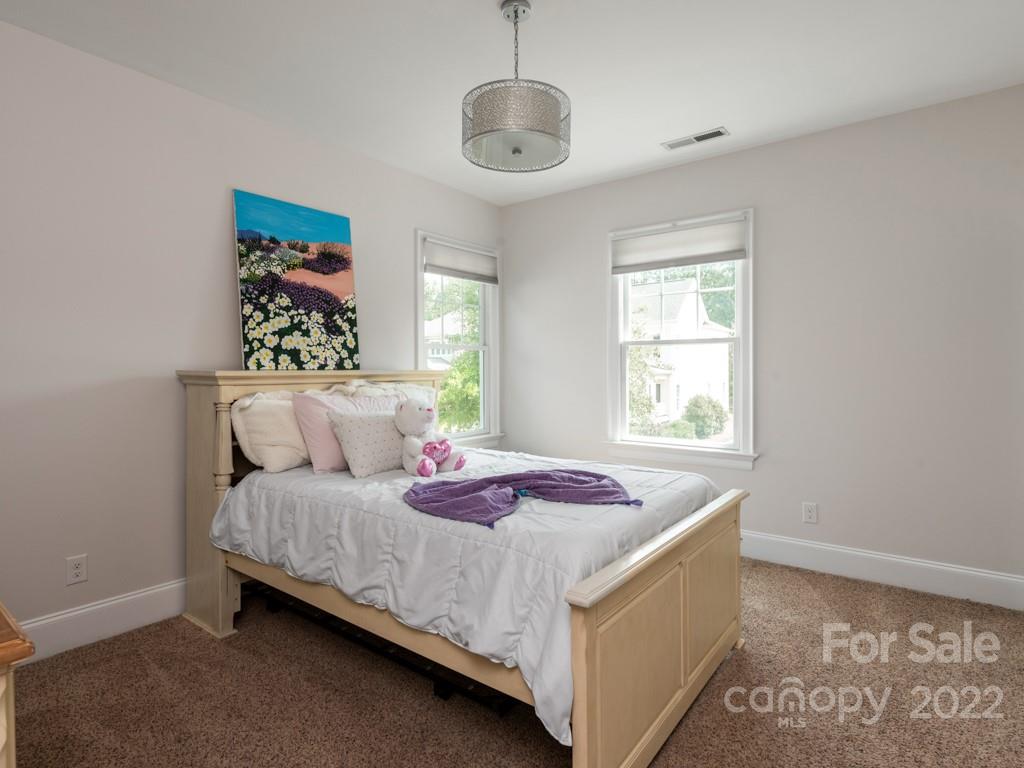 5711 Morris Hunt Drive Fort Mill, SC 29708 - Photo 23 of 43 a bedroom with a bed and a window