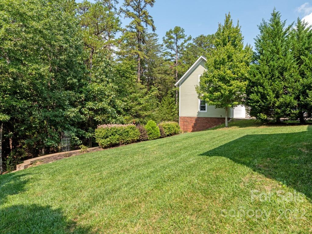 5711 Morris Hunt Drive Fort Mill, SC 29708 - Photo 37 of 43 a view of a house with a yard