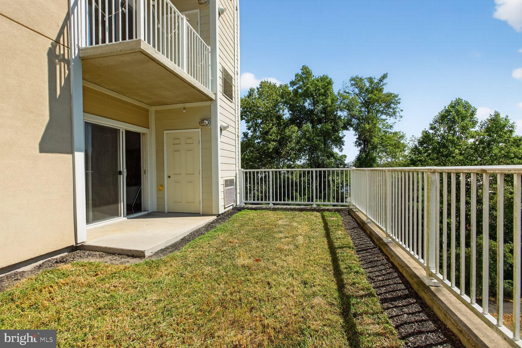 6301 Edsall Road, Unit 123 Alexandria, VA 22312 - Photo 17 of 36 Serene balcony with lush green views.