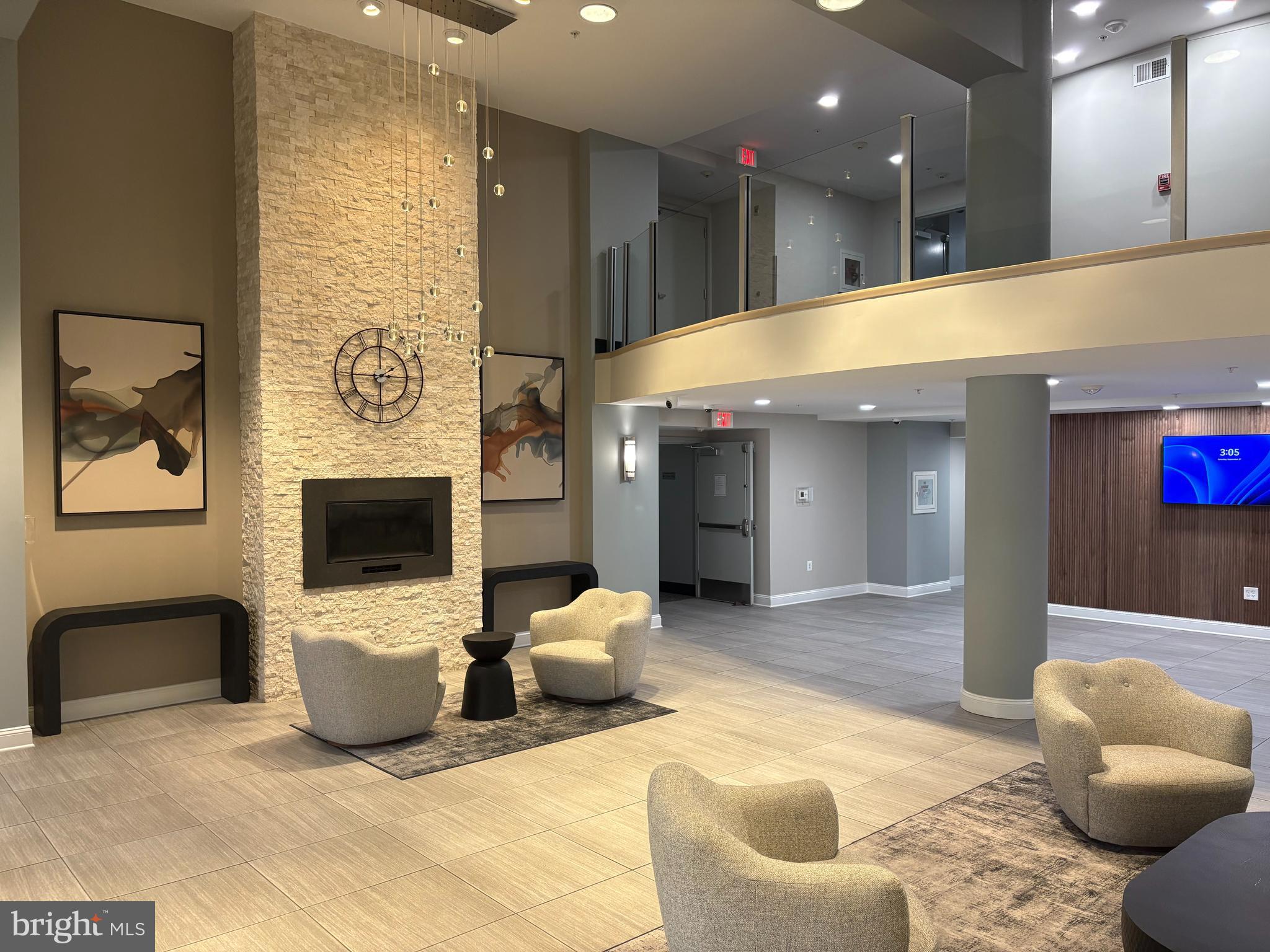 6301 Edsall Road, Unit 123 Alexandria, VA 22312 - Photo 35 of 36 Modern lobby with elegant design elements.