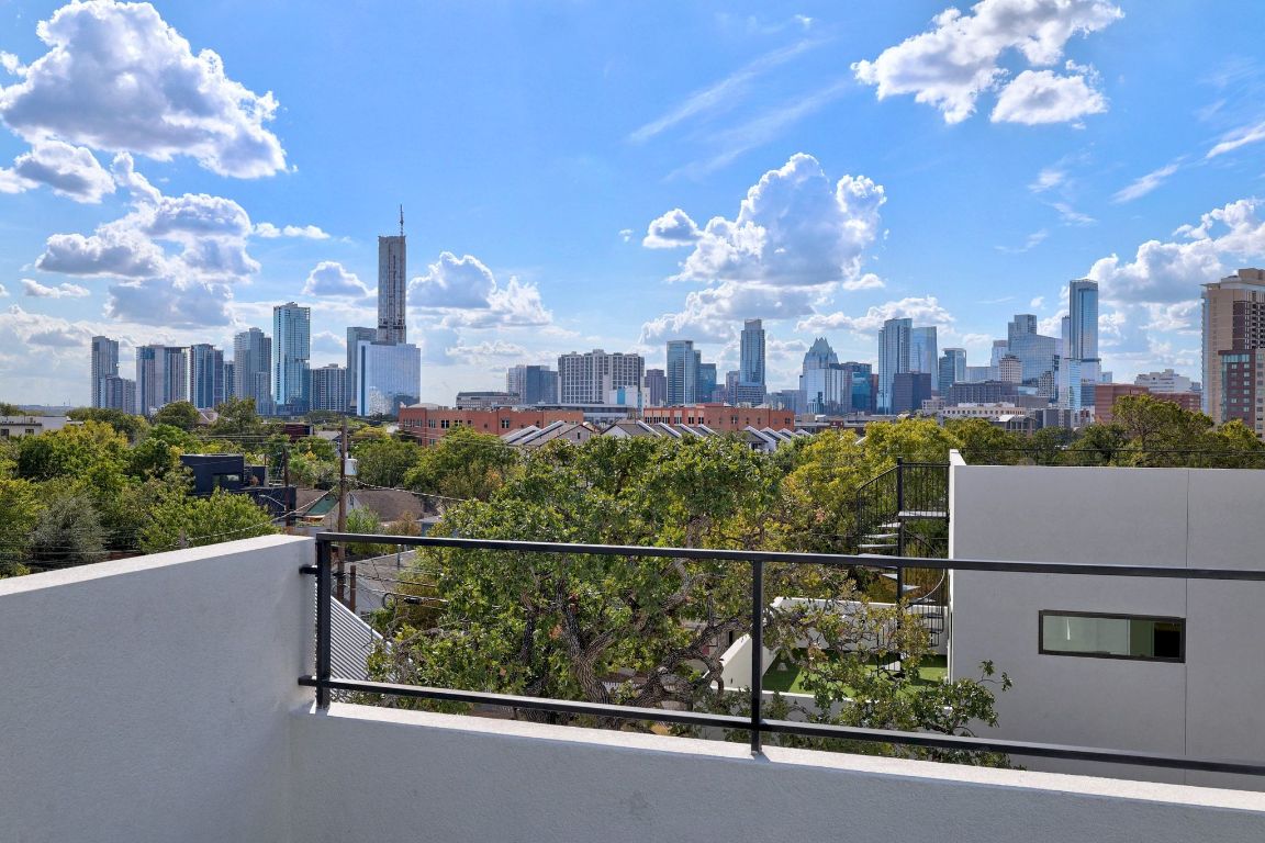 a view of a city from a balcony
