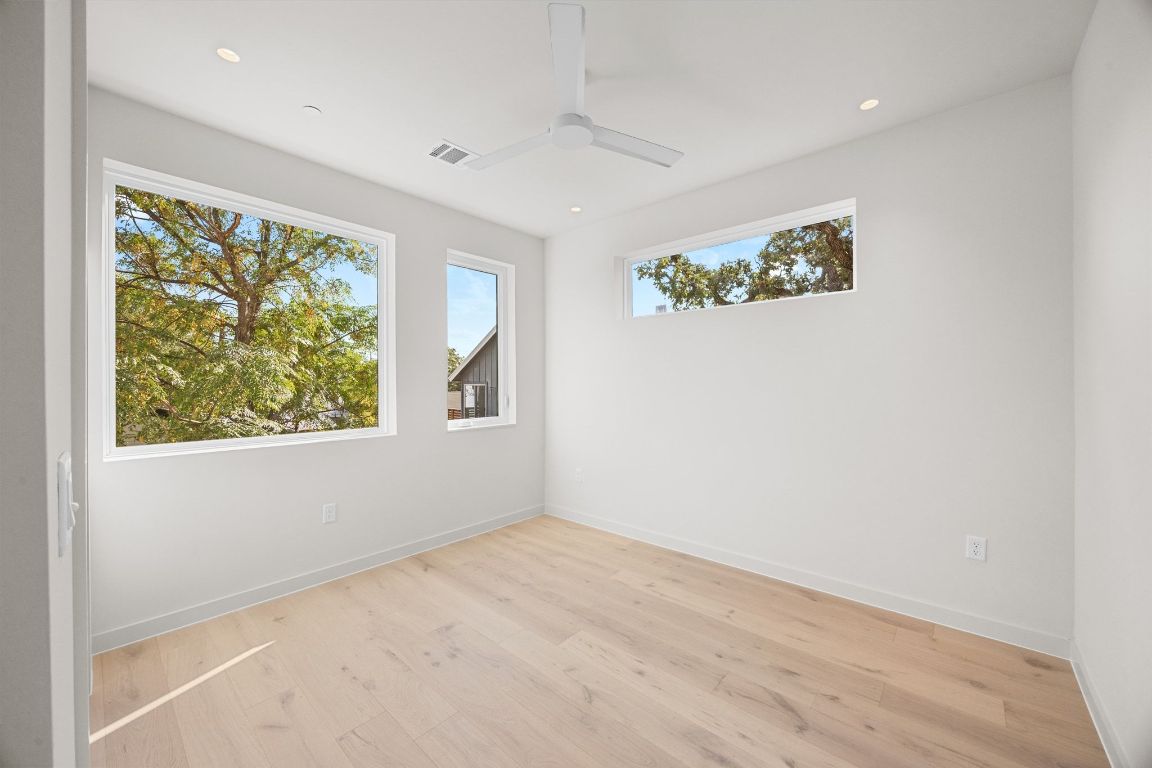 1175 Navasota Street, Unit 2 Austin, TX 78702 - Photo 25 of 40 an empty room with a window