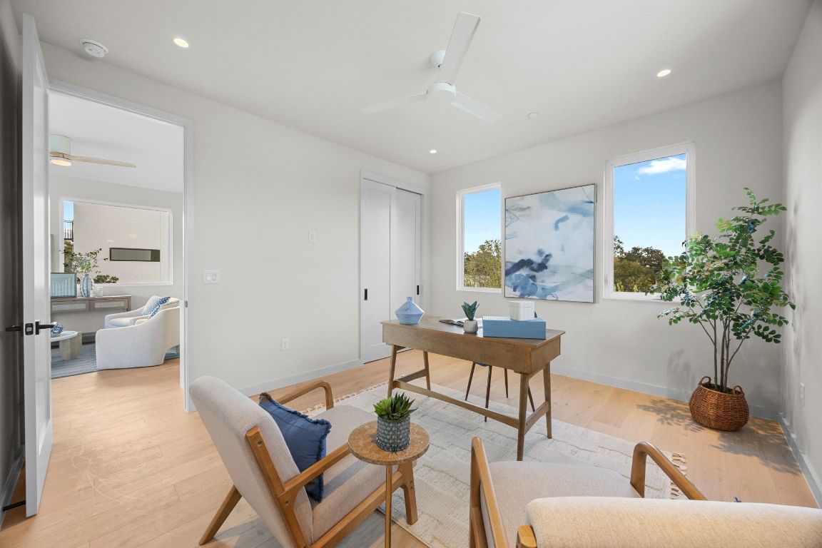 1175 Navasota Street, Unit 2 Austin, TX 78702 - Photo 34 of 40 a living room with furniture and a potted plant
