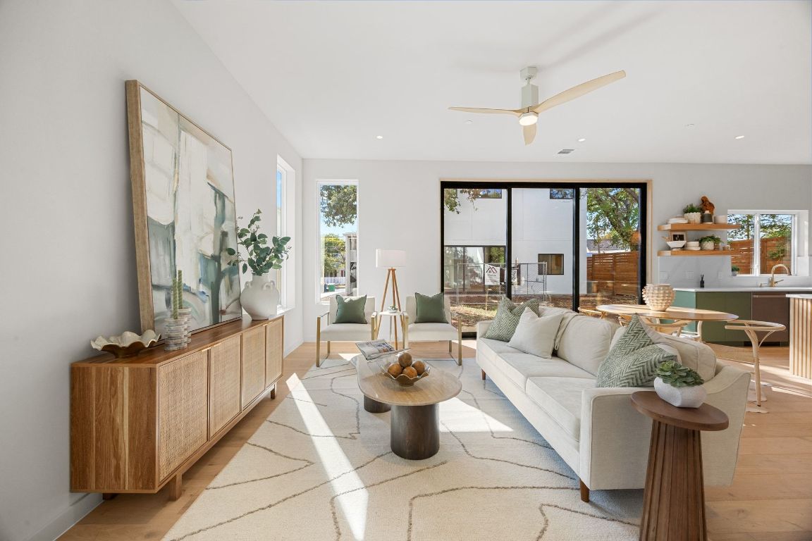 1175 Navasota Street, Unit 2 Austin, TX 78702 - Photo 7 of 40 a living room with furniture and a potted plant