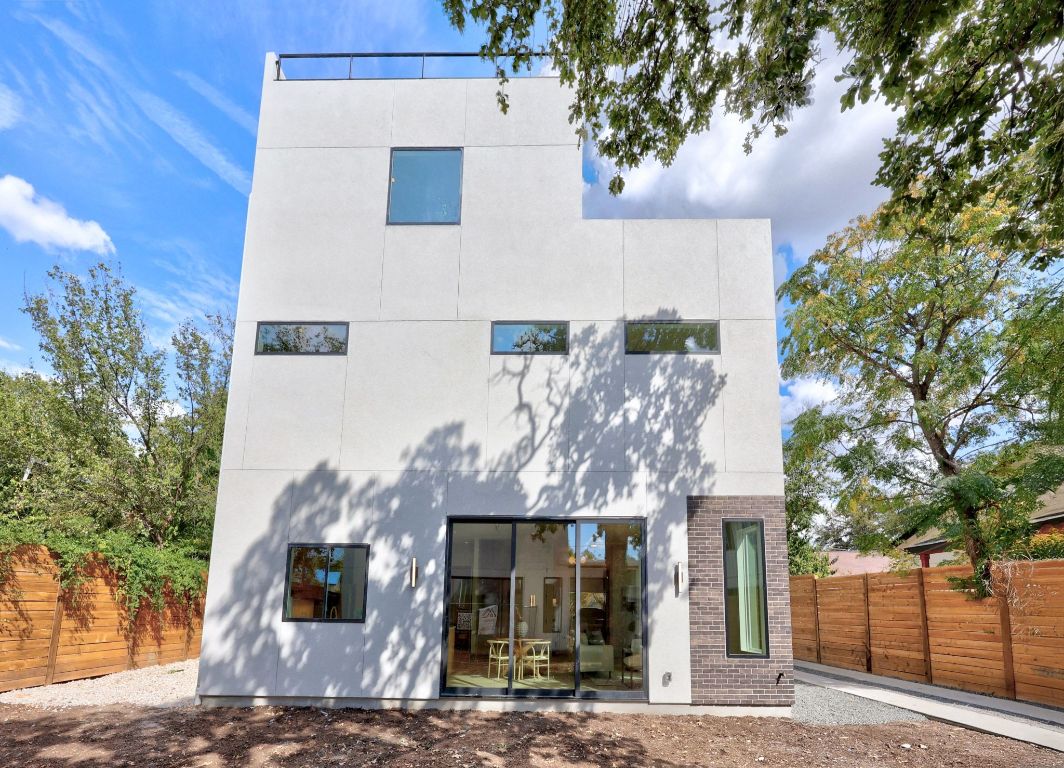 1175 Navasota Street, Unit 2 Austin, TX 78702 - Photo 9 of 40 a front view of a house with garden