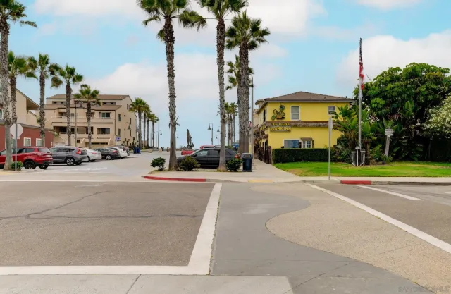 a view of a street with cars