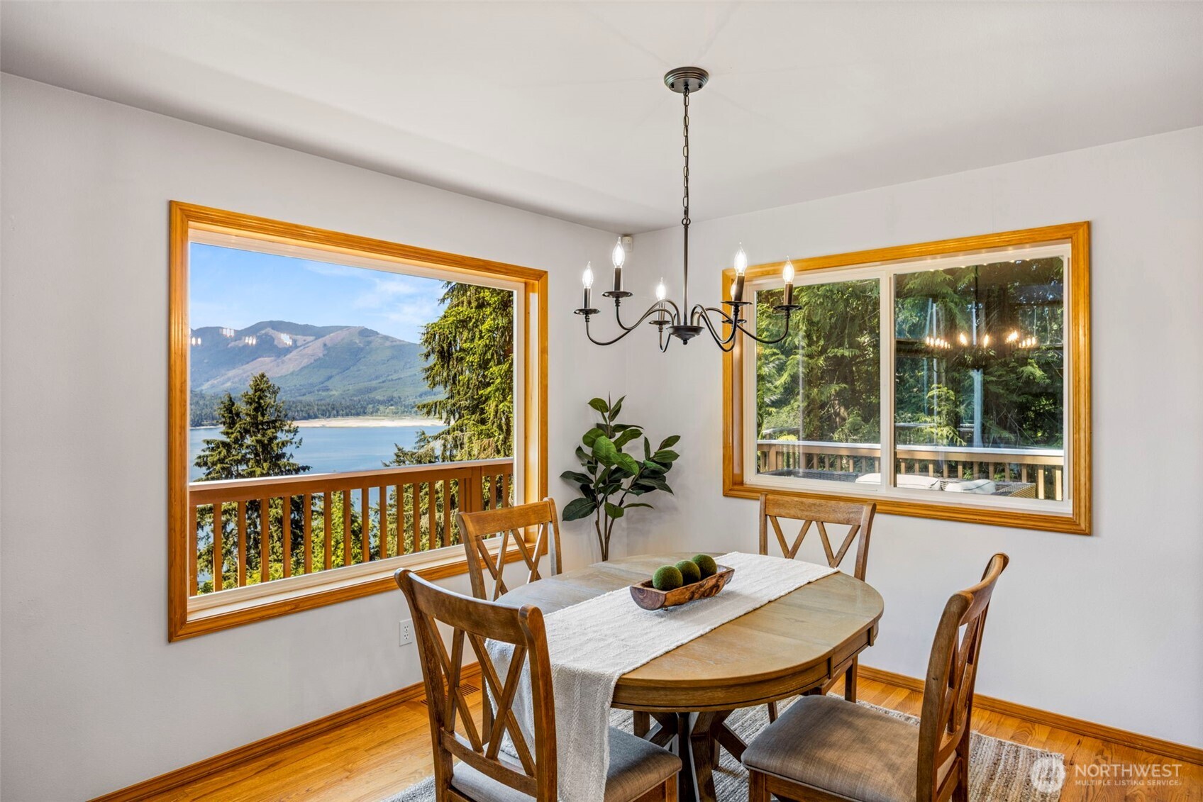 19736 Northwest Stavis Bay Road Seabeck, WA 98380 - Photo 13 of 39 a view of a dining room with furniture window and outside view