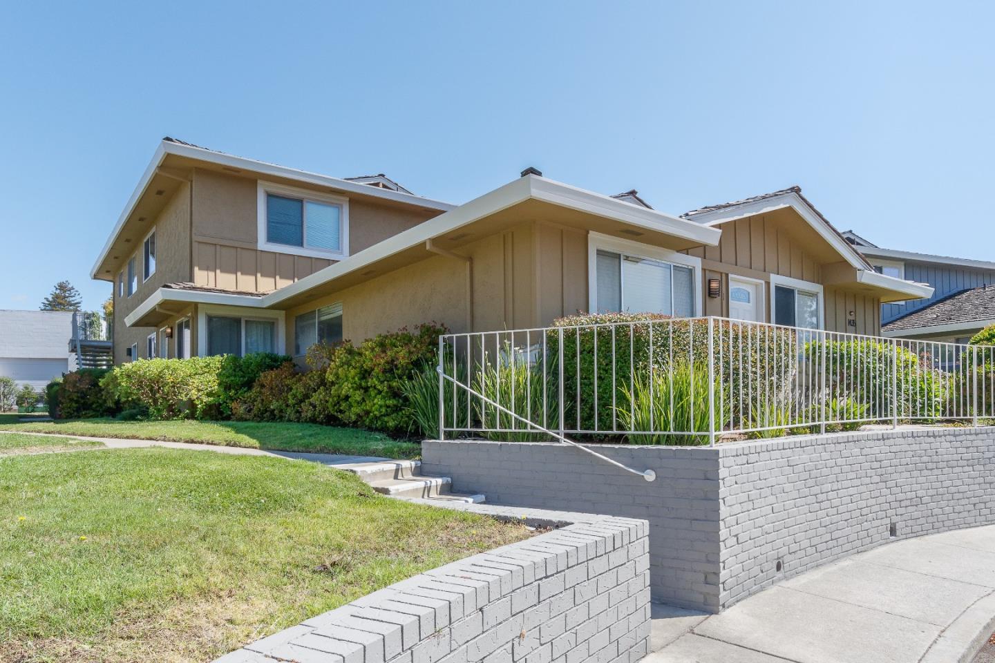 4435 Diamond Street, Unit 1 Capitola, CA 95010 - Photo 2 of 18 a house view with a garden space