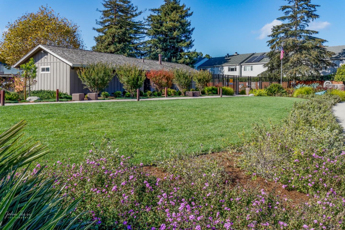 4435 Diamond Street, Unit 1 Capitola, CA 95010 - Photo 16 of 18 a front view of house with yard and green space