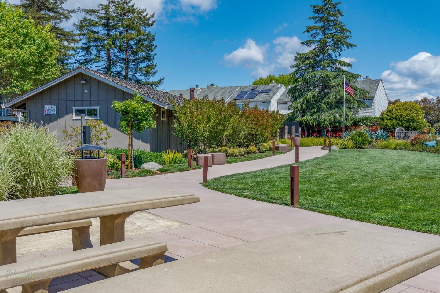 4435 Diamond Street, Unit 1 Capitola, CA 95010 - Photo 17 of 18 a front view of house with yard and green space