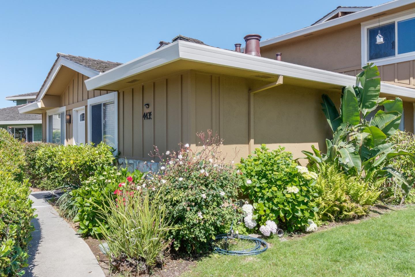 4435 Diamond Street, Unit 1 Capitola, CA 95010 - Photo 3 of 18 a front view of a house with a yard