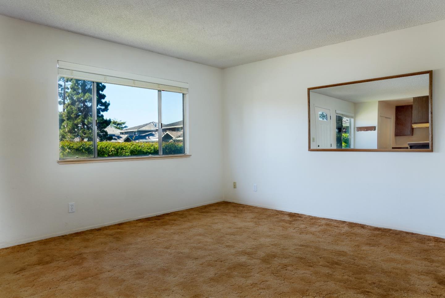 4435 Diamond Street, Unit 1 Capitola, CA 95010 - Photo 4 of 18 an empty room with a window