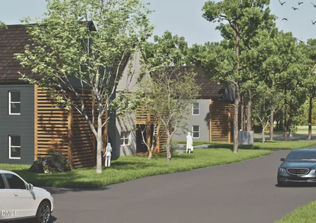 a view of a parked cars in front of a building