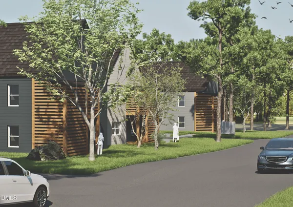 a view of a parked cars in front of a building